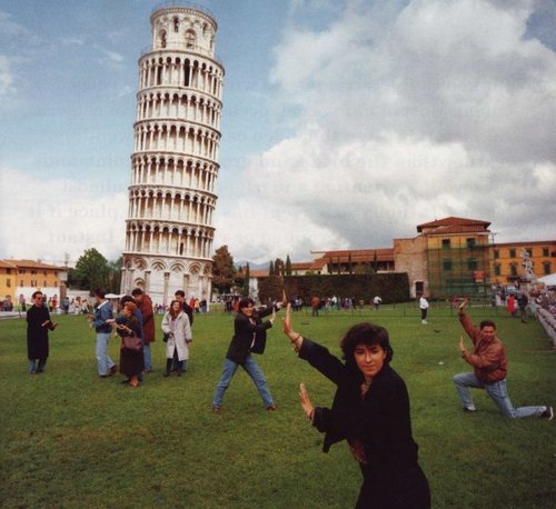 three-kungfu-masters-in-front-italy-pizza-tower